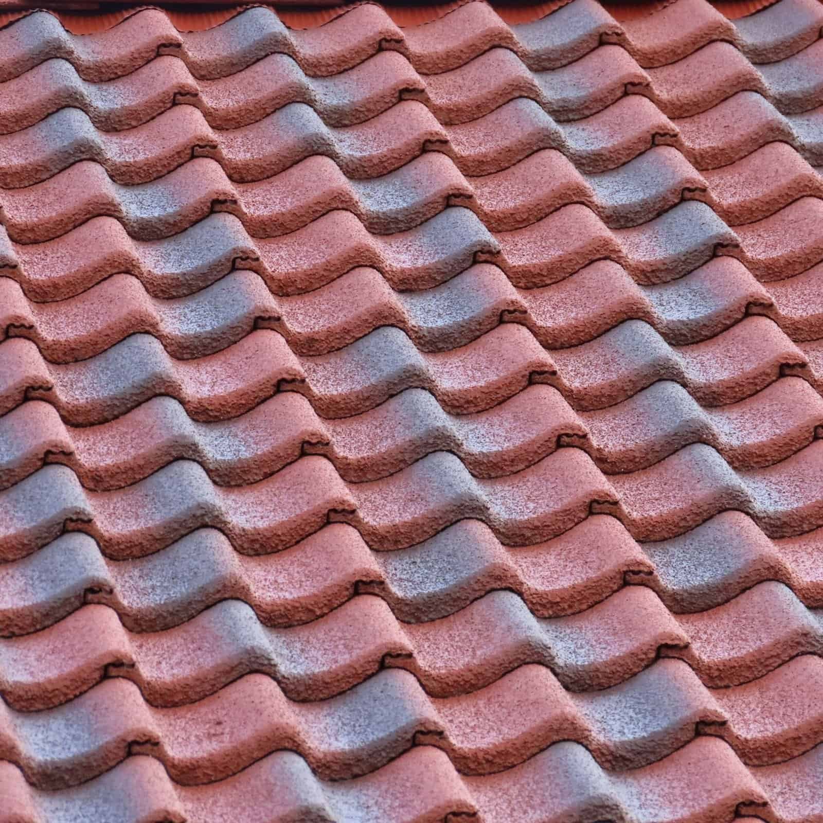 tiled-roof-with-red-tiles-in-a-residential-area-of-2025-02-09-18-02-52-utc-scaled.jpg